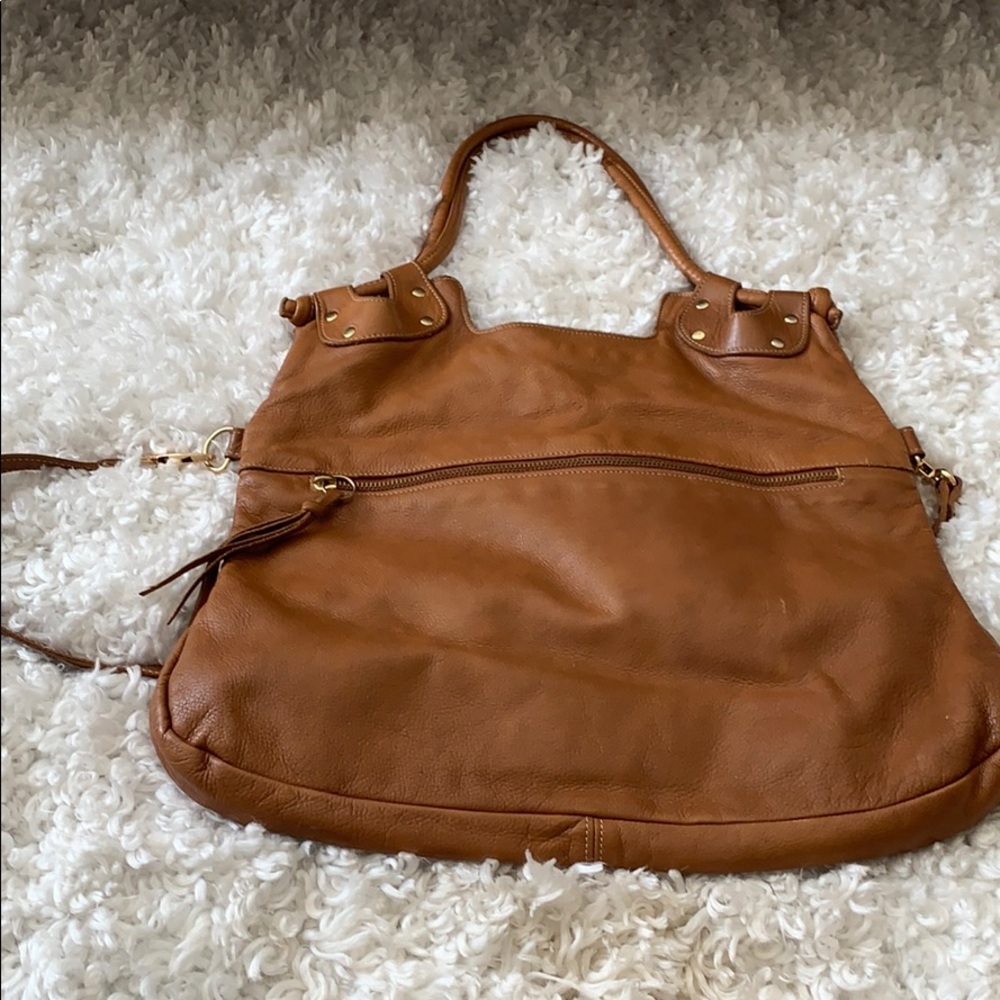 Brown leather fold over bag